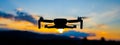 Drone silhouette at sunset time Royalty Free Stock Photo
