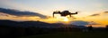 Drone silhouette at sunset time Royalty Free Stock Photo