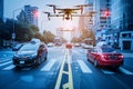 Drone Surveillance in a Busy City Intersection Royalty Free Stock Photo