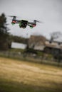 Drone Toy tilted Portrait with green body flying in air