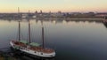 Drone video over the Rhine and Mainz waterfront with sailing ship in the morning during sunrise Hallo Sergio,kannst du das etwas