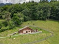 Drone view at the alp chalet of Heidi village over Maienfeld in the Swiss alps Royalty Free Stock Photo