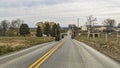 Drone View of an Amish Horse and Buggy Traveling Along a Country Road on a Summer Day Royalty Free Stock Photo