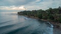 Drone view of beautiful jungle caribbean beach with nice surf close to Playa Cocles and Puerto Viejo in Costa rica. View towards Royalty Free Stock Photo