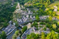 Drone view of Belcastel village overlooking fortified castle, France Royalty Free Stock Photo