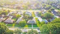 Bird eye view clean and peaceful neighborhood streets with row of single family homes near Dallas, Texas, USA