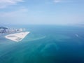 Drone view cruise ship move near Gurney Wharf reclamation island