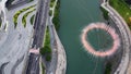 Drone view of dancing fountains light show near famous Meixihu International Culture and Arts Centre