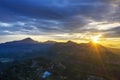 Drone view of foggy Puncak with sunrise beam Royalty Free Stock Photo