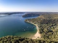 Drone view of Great Mackerel Beach and Wharf, Sydney, NSW, Australia. Royalty Free Stock Photo