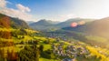 Drone view of the Kleinwalsertal at sunset with the city of Riezlern in the back, the Alps, Austria Royalty Free Stock Photo