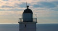 Drone view lighthouse on coastline at morning sunrise. Panoramic view seascape.