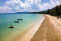 Drone view of longtail boats moored off a tropical sandy beach in Khao Lak, Thailand Royalty Free Stock Photo