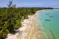 Drone view of longtail boats moored off a tropical sandy beach in Khao Lak, Thailand Royalty Free Stock Photo