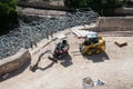 Drone view of a mini excavator and a skid steer loader at the construction site Royalty Free Stock Photo