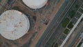 Drone view oil tanks at petrochemical factory. Fossil fuel storage buildings Royalty Free Stock Photo