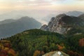 Drone view of parked big modern camper motorhome on background of mountains and Boka Kotorska bay, Montenegro. Family vacation