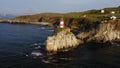 Drone view of the picturesque old Basargin lighthouse on the coast of the sea