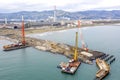 Drone view of a pier construction and piles. Working piers were built for the handling of passengers and cargo onto and off ships