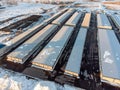 Drone view of a rental storage unit facility with closed bay doors.