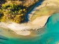 Drone view of the river and forest in the glacier valley. View of the moraines. Landscape from the air.