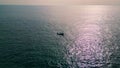 Drone view ship sailing at sunny marine landscape. Lonely yacht in open water Royalty Free Stock Photo