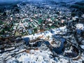 drone view of a small village during a winter flood, showcasing the destruction and devastation of nature