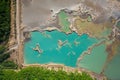 Drone view of the turquoise lake formed as a result of mining waste Royalty Free Stock Photo