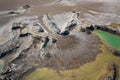 Drone view of the turquoise lake formed as a result of mining waste Royalty Free Stock Photo