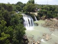 The drone view of a wonderful Toroan Waterfall in Sampang Regency