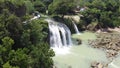 The drone view of a wonderful Toroan Waterfall in Sampang Regency
