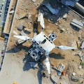 drone weapon flying under destroyed city. Military technology, wide angle, garbage on ground, exploded factory