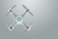 Drone, white quadrocopter on a white background with copy space. Top view, flat lay. The concept of technology, robotization,