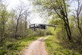 Drone in the woods, a drone flys in the  woods over the foot path Royalty Free Stock Photo