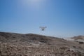 Drones in the air capturing landscape in the quarry area