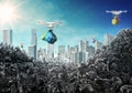 Drones carry garbage bags from the city to the dump.