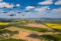 Drones fly over the fields. Natural landscape with drones and quadrocopters flying over it Royalty Free Stock Photo