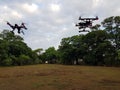 2 Drones hovering at 12 feet Royalty Free Stock Photo