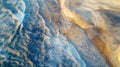 A droneseye view captures the intricate patterns and mesmerizing shapes created by the winds constantly shaping the sand