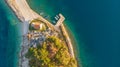 Drop down view of coastal village at sunset. Royalty Free Stock Photo