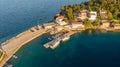 Drop down view of coastal village at sunset. Royalty Free Stock Photo