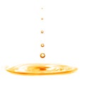 Drop falling into orange water with splash isolated on white Royalty Free Stock Photo