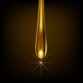 Drop gold on brown background with reflection