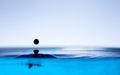 Drop of ink falling Royalty Free Stock Photo