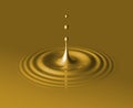 Drop of liquid gold and ripple Royalty Free Stock Photo