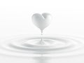 Drop of milk in form of heart Royalty Free Stock Photo