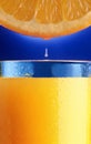 Drop of orange juice. Royalty Free Stock Photo