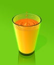 Drop of orange juice and ripple in a glass Royalty Free Stock Photo