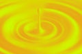 Drop of orange juice splashing and making ripple or circle. 3D illustration. Royalty Free Stock Photo