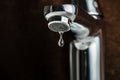 A drop of pure water dripped from the tap. Royalty Free Stock Photo